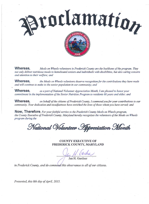Proclamation presented to Meals on Wheels volunteers by County Executive Gardner